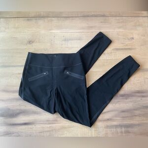 Spanx black leggings with side detail and front zip pockets